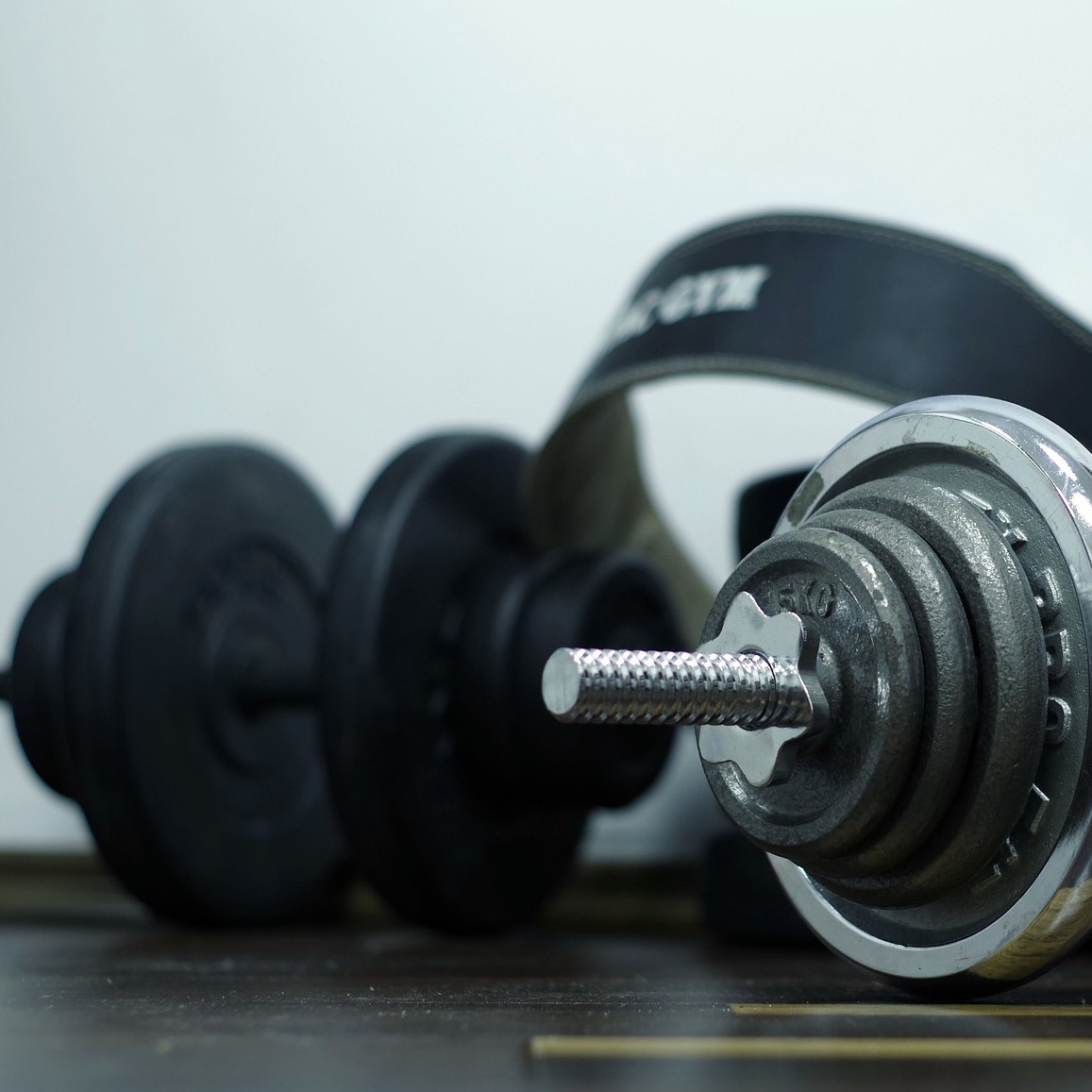 Dumbbells with a lifting belt