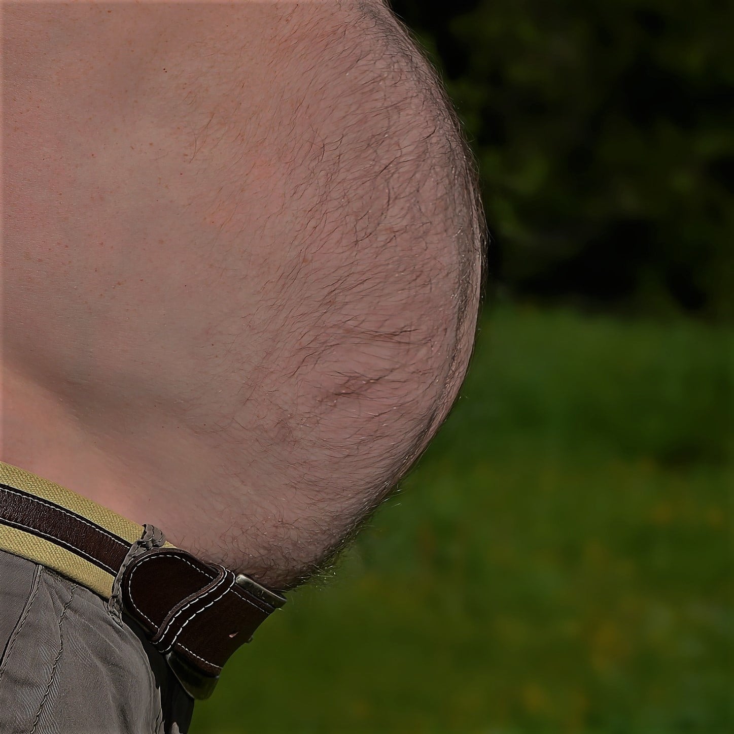 A man with a huge fat belly