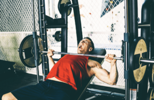 A man doing bench press